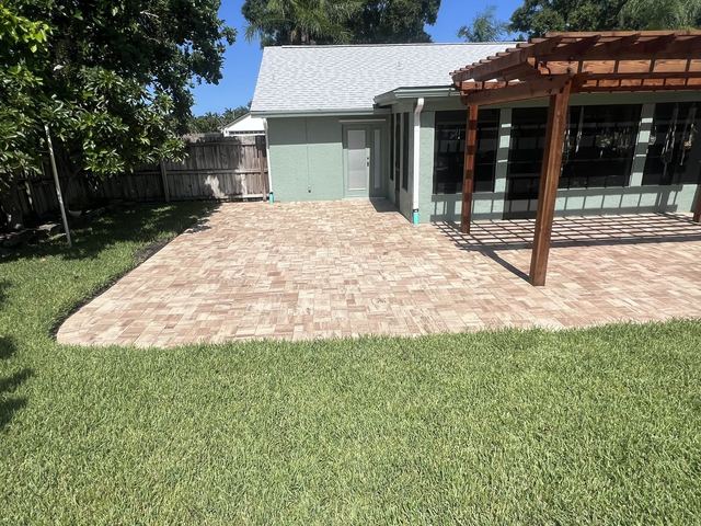 Paver surface cleaned and sealed by Groundworks, Brevard County