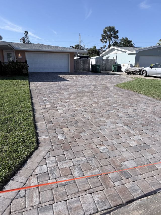 Paver surface cleaned and sealed by Groundworks, Brevard County