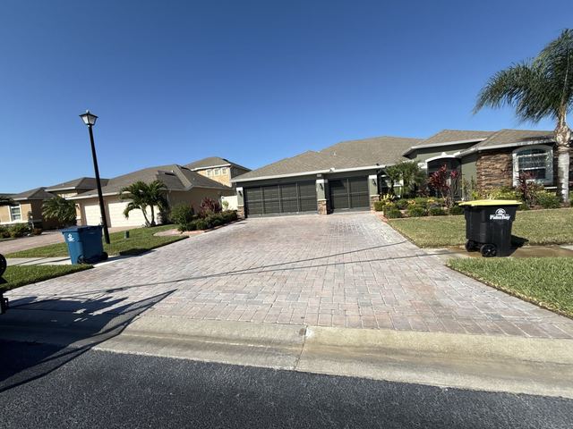 Paver surface cleaned and sealed by Groundworks, Brevard County